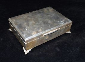SILVER CIGARETTE BOX Makers mark JBC & S Ld., 16.5cm W x 12cm L x 5cm H. Sterling silver mounted,