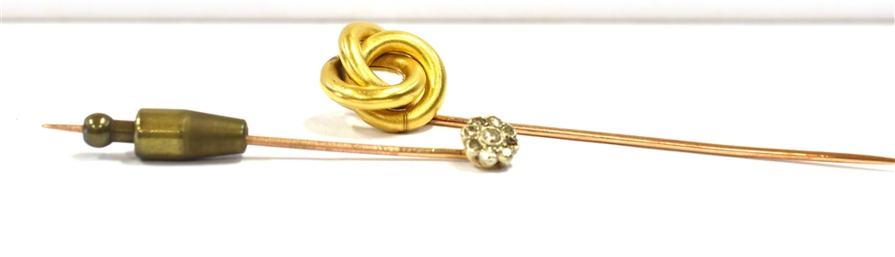 GOLD & ESTATE DIAMOND STICK PINS One high carat gold lovers knot, on an 18ct gold stick pin, with