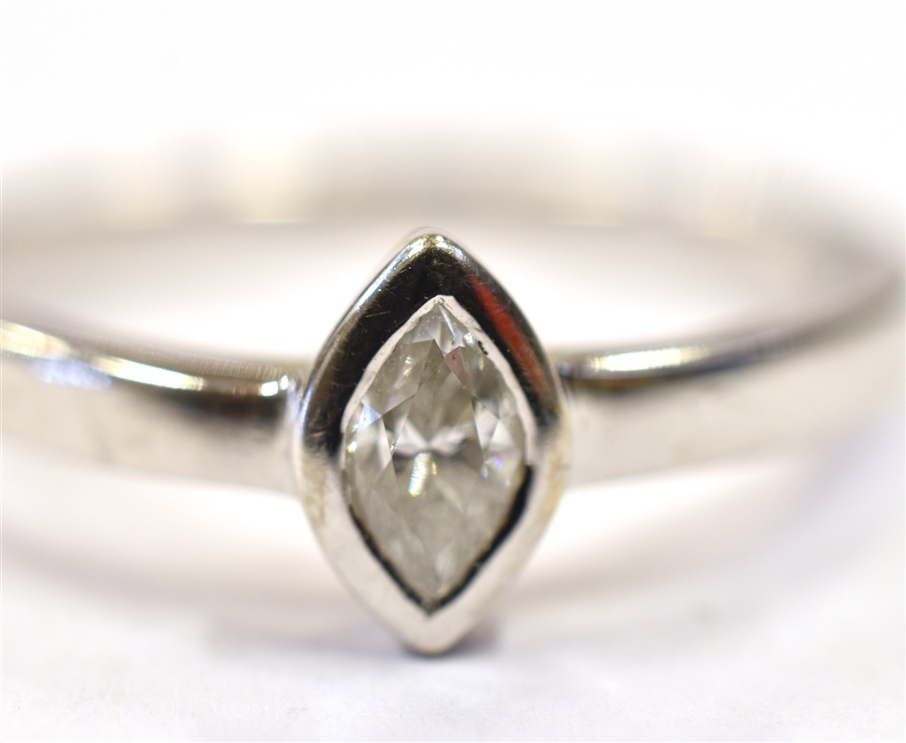 18CT WHITE GOLD DIAMOND SOLITAIRE Bezel set marquise cut diamond, estimated in the setting as 0.35