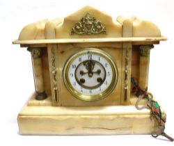 A VICTORIAN MANTEL CLOCK the circular white enamel dial with black Arabic numerals and a visible