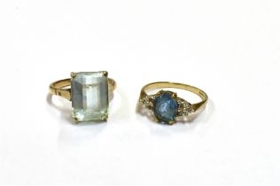 9CT GOLD AQUAMARINE & DIAMOND RINGS To include an octagonal step cut, pale blue aquamarine,