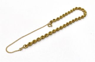 9CT GOLD ROPE LINK BRACELET 17cm long x 4.1mm wide with bolt ring clasp and attached safety chain.