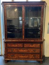 A CONTINENTAL MARQUETRY CABINET ON CHEST the upper portion with pair of glazed doors inclosing two
