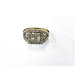 9CT GOLD & DIAMOND RING 11.8mm square head, with central bezel and grain set princess and