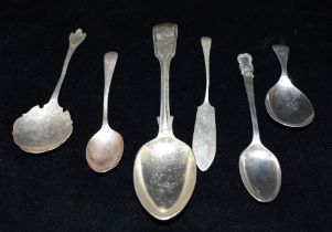 A QUANTITY OF STERLING SILVER SPOONS To include a trefid topped spoon with reeded rat tail and