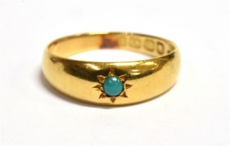 VICTORIAN 18CT GOLD & TURQUOISE RING Star grain set round turquoise cabochon and integral shank.