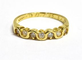 18CT GOLD DIAMOND ETERNITY RING Seven round brilliant cut diamonds, estimated 0.23 carats, with
