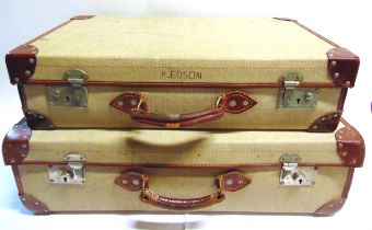 TWO BRITISH SERVICE ISSUE CANVAS SUITCASES the largest dated 1965 and 20cm high, 72cm wide, 42cm