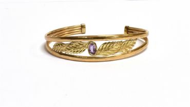 9CT GOLD & AMETHYST CUFF BANGLE 13.5-6.4mm tapering twin rail cuff style bangle, with central