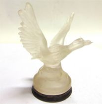 AUTOMOBILIA - A FROSTED GLASS CAR MASCOT IN THE FORM OF A DUCK TAKING WING unmarked, 14.5cm high.