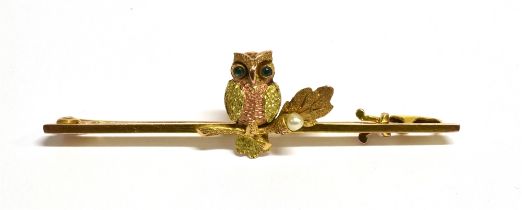 ANTIQUE TRI COLOUR GOLD OWL BROOCH In 9ct gold, 5cm long rectangular bar brooch, depicting an owl