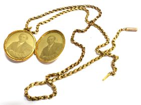 ANTIQUE GOLD LOCKET & CHAIN Both in 9ct gold, oval locket decorated with vertical bands and