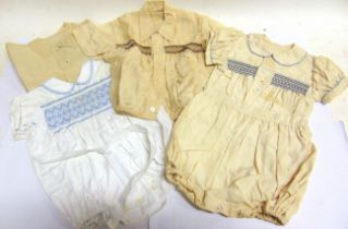 A COLLECTION OF INFANT BOY'S CLOTHING mid 20th century, including smocked shirts / blouses and all-