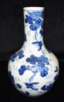 A CHINESE BLUE & WHITE VASE with butterfly and fruit decoration, 33cm high. Condition Report :