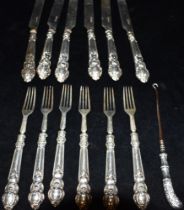 VICTORIAN SILIVER FLATWARE Set of six silver knives & forks with scroll and shell embossed