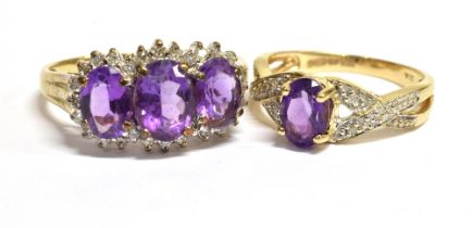 9CT AMETHYST & DIAMOND DRESS RINGS One claw set with three oval mixed cut amethysts, estimated to