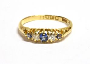 ANTIQUE 18CT SAPPHIRE & DIAMOND RING Belcher claw set cornflower blue sapphires, flanked by old