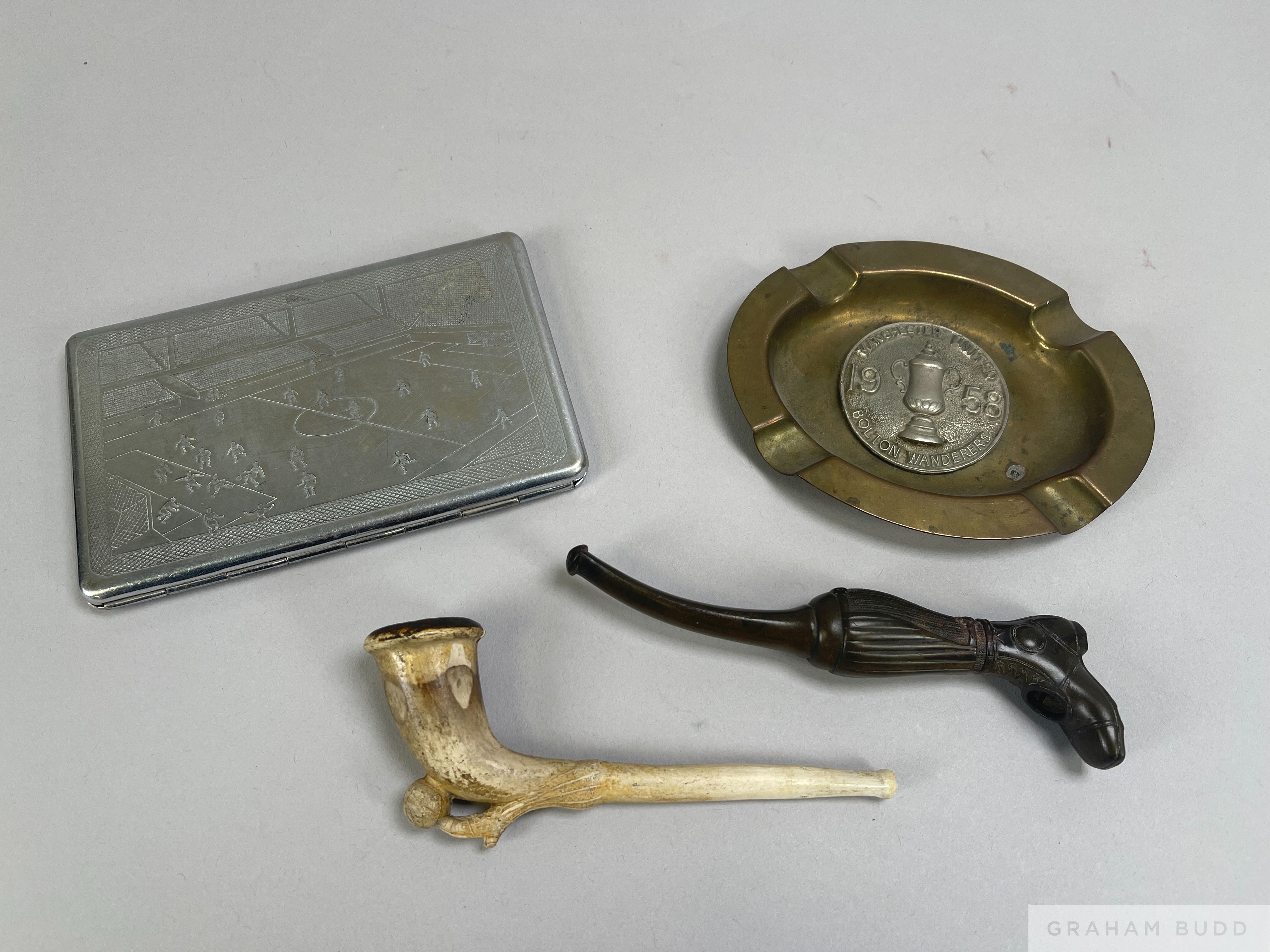 A white-metal and brass ashtray commemorating the 1958 F.A.Cup Final