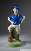 Britannia Pottery 'Wee MacGregor' football figure decorated in the colours of Glasgow Rangers