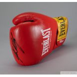 A red Everlast 10oz sparring glove autographed by Glenn McCrory