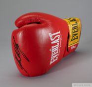 A red Everlast 10oz sparring glove autographed by Glenn McCrory
