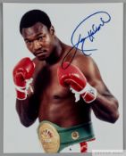 Larry Holmes World Heavyweight Boxing Champion 1978-85 original autographed colour photograph