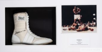 Muhammad Ali signed right boxing boot mounted is a display case,