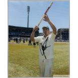 Excellent colour photographs signed to light part of image Warne walking off pitch