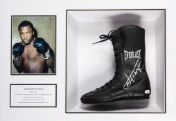 Joseph William 'Joe' Frazier signed left boot mounted in a display case,