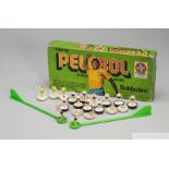 A box with players from the Subbuteo game, "Pelebol,