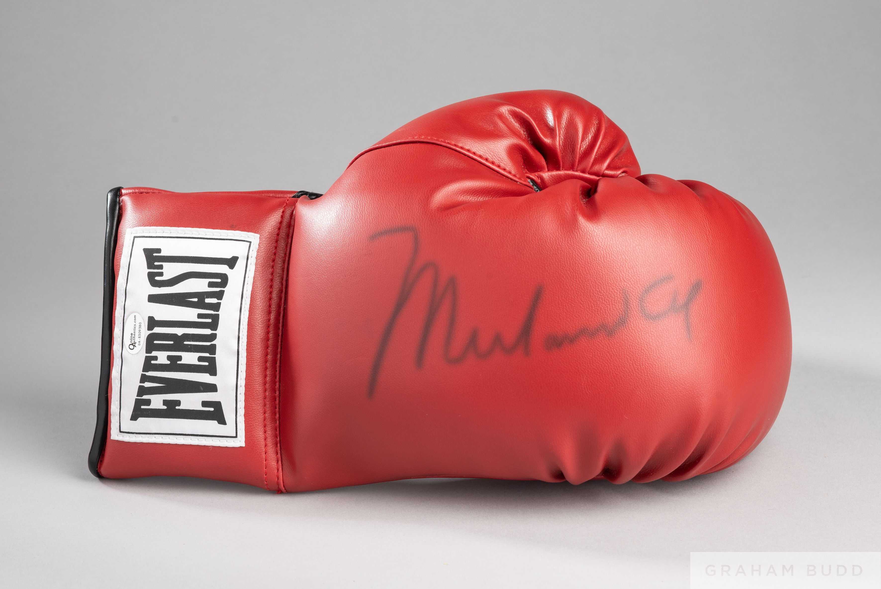 A Muhammad Ali autographed 10oz Everlast boxing glove