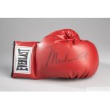 A Muhammad Ali autographed 10oz Everlast boxing glove