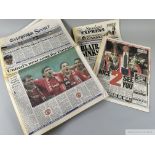 Two boxes of newspapers with stories relating to Manchester United