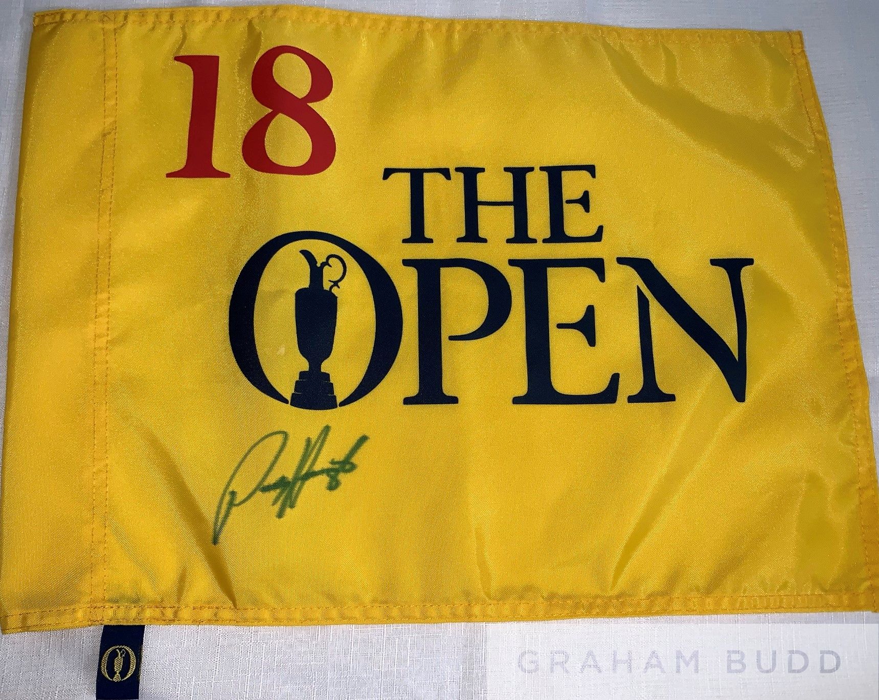 Padraig Harrington (Ireland, 2007 & 2008 Open Champion) signed flag and cap,