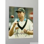 Excellent cricket coloured signed photograph of Shane Warne,