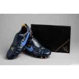 Pairs of vintage Nike Tiempo Ronaldinho FG R10 football boots