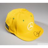 Lewis Hamilton signed yellow and green Mercedes AMG Petronas Motorsport cap