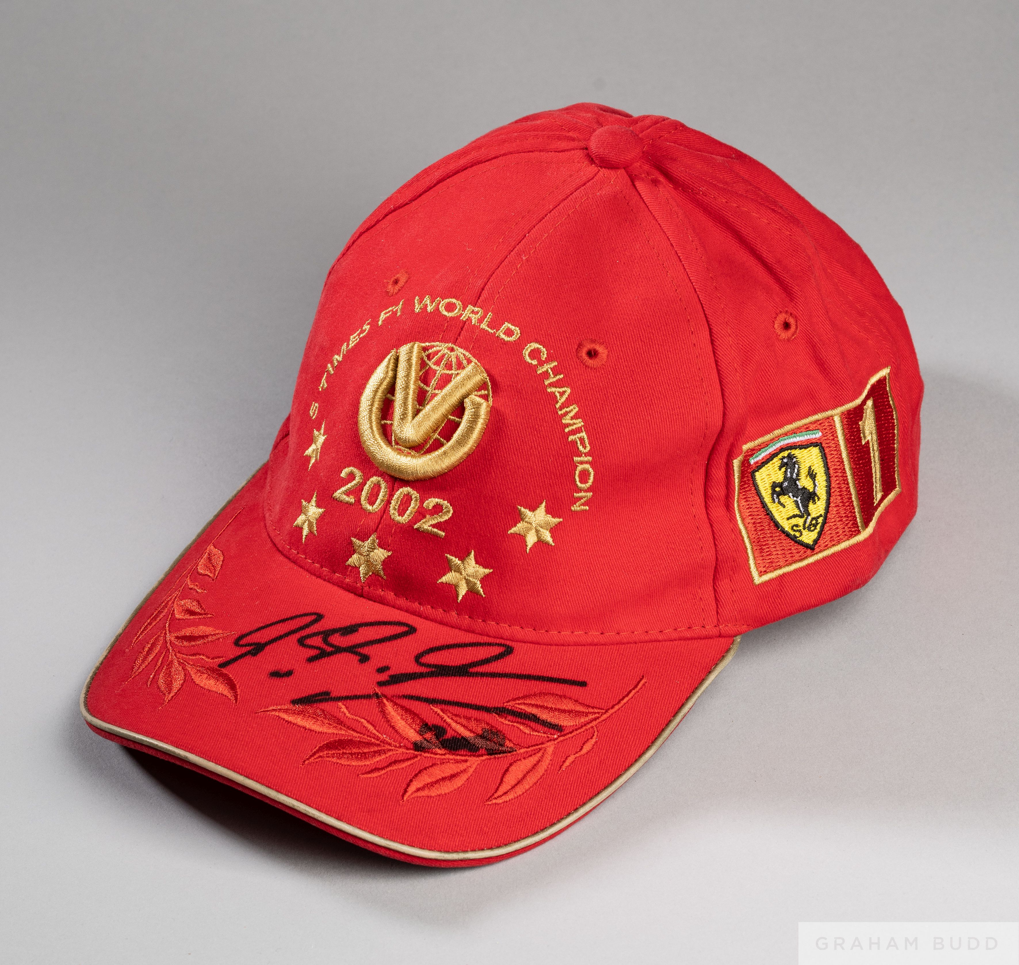 Michael Schumacher signed 2002 red DVAG cap