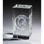 A trophy presented to Pelé composed of a large crystal block with an internal laser-etched image of