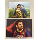 Colour autographed photographs of Lionel Messi and Kylian Mbappe