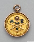 Tommy Wilson 9ct gold and enamel medal