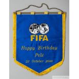 A pennant presented to Pelé in 2000 by FIFA to commemorate his 60th birthday.