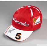 Sebastian Vettel signed red and white Ferrari F1 cap