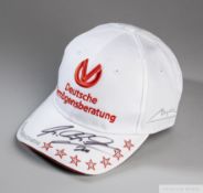 Michael Schumacher signed white and red cap