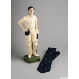 A 20th Century plaster painted cricket figure