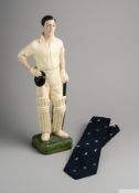 A 20th Century plaster painted cricket figure