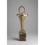 A gold tone base metal trophy given to Pelé by "AS" [Associazione Sportiva]