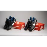 Two pairs of vintage Nike United Multistud football boots