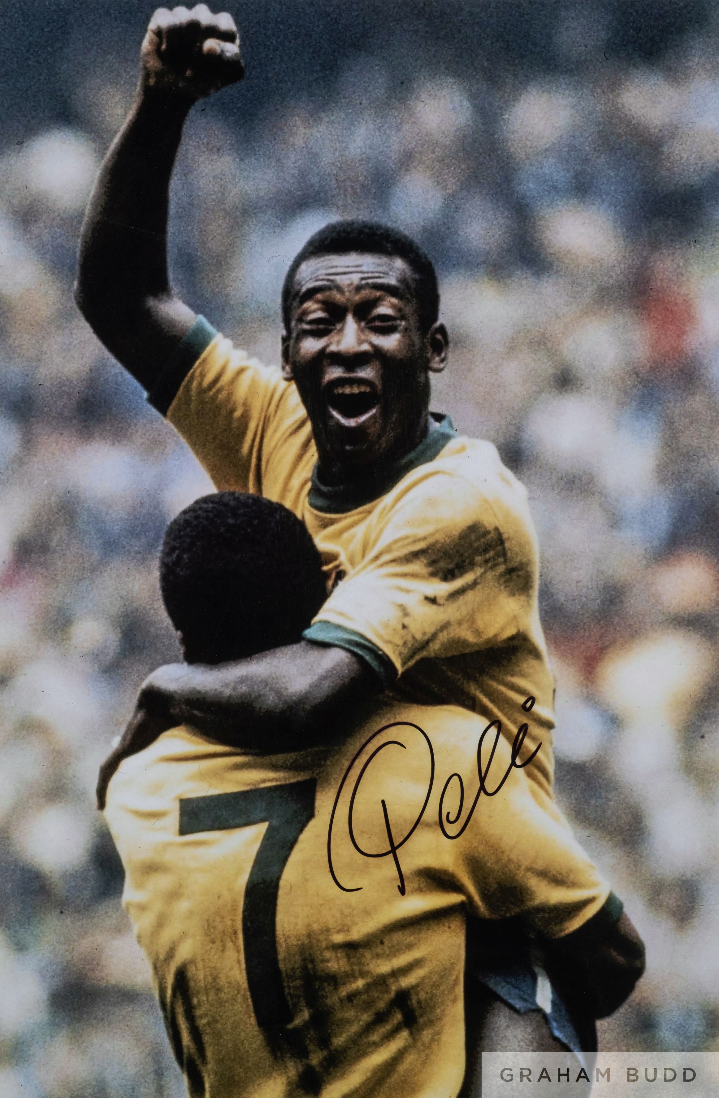 A large colour portrait photograph of Pele celebrating his legendary "Goal of the century"