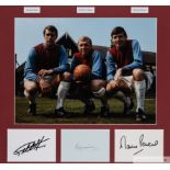 Photographic display signed by West Ham United's 1966 World Cup trio